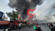 افزایش مصدومان آتش سوزی هولناک انبار لوازم یدکی در میدان گمرک + فیلم