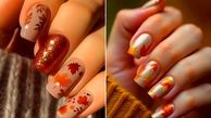 دیزاین ناخن پاییزی: الهام از برگ‌ های رنگارنگ و خطوط طلایی + نمونه‌ ها
