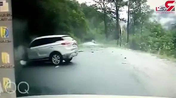 فیلم لحظه سقوط تخته سنگ بزرگ روی شاسی بلند / ماشین پرس شد + تصویر